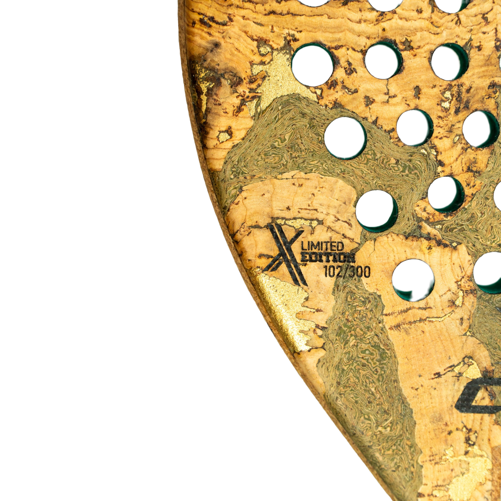 Close-up of a gold and green limited edition product with cut-out design
