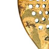 Close-up of a gold and green limited edition product with cut-out design