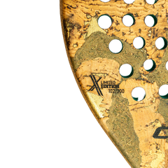 Close-up of a gold and green limited edition product with cut-out design