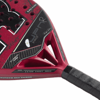 Close-up of a red and black padel racket with branding