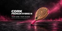 A single padel racket shown at an angle on a dark reflective surface with pink mist and lighting. Large text on the left reads 'CORK PREMIUM HYBRID III' with smaller text 'YOUR GAME.