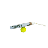 Cork padel bat with a yellow ball on a white background